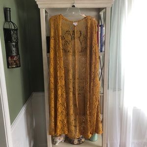 Dark mustard colored Joy vest